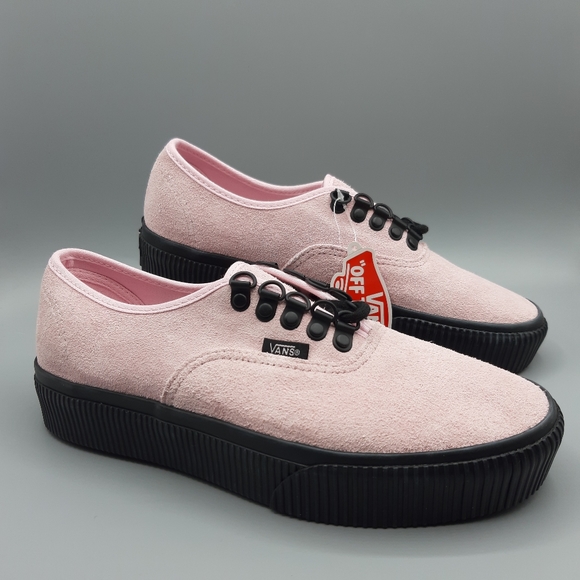 pink and black platform vans